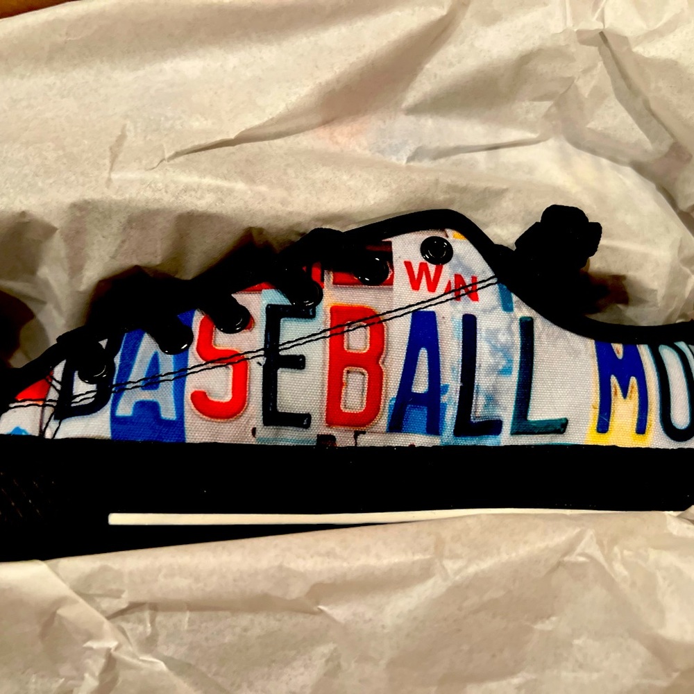 Black pair of “BASEBALL MOM” shoes size 7. Multi colored letters.